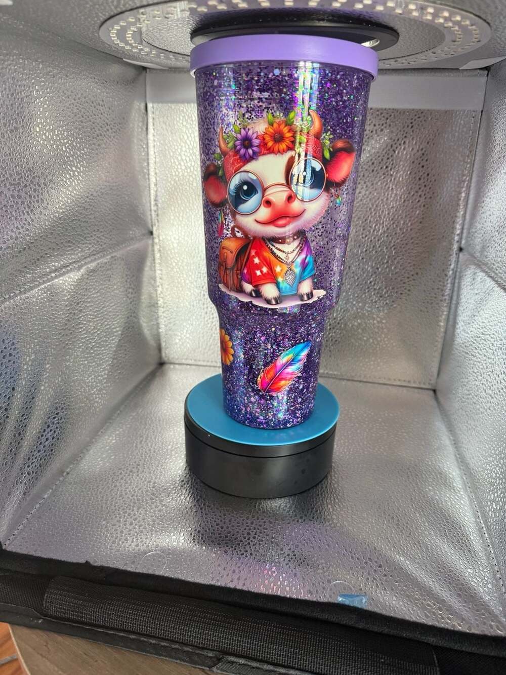 Custom 30 oz Purple Glitter Highland Cow Tumbler with Feather and Floral Detail